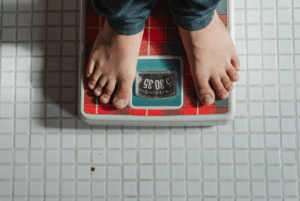 West Texas Bariatrics Patient Standing on Scale